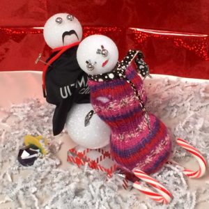 We loved this tandem sledding snow couple from Madison Galan at Alliance Residential. Stellar moustache.